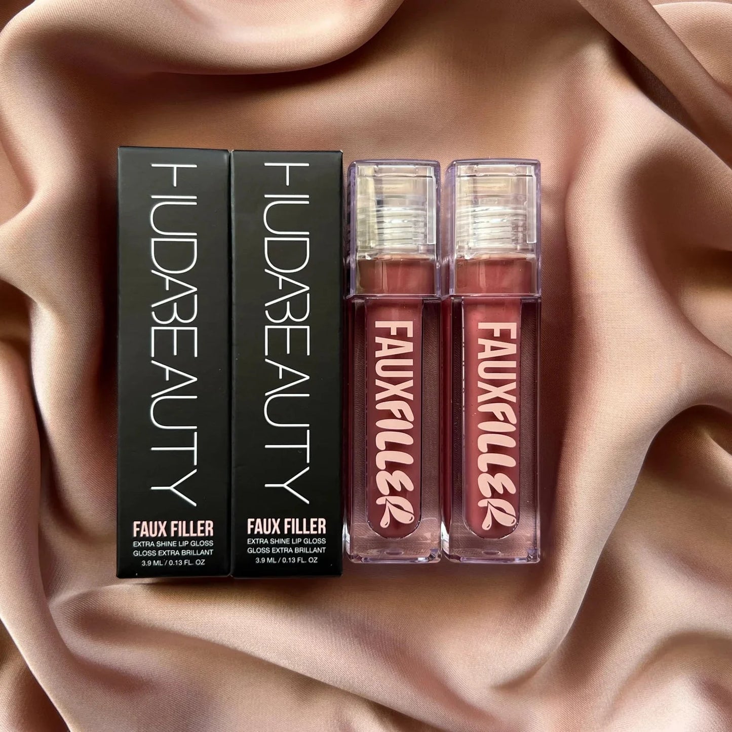 HUDA BEAUTY FAUX FILLER EXTRA SHINE LIP GLOSS